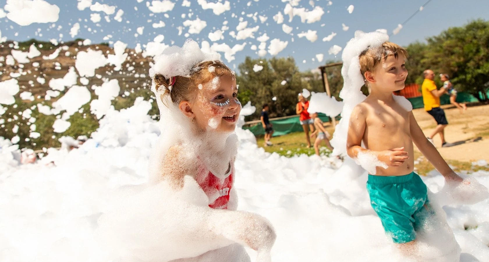 A girl and a boy celebrating a birthday in foam with CyprusShows