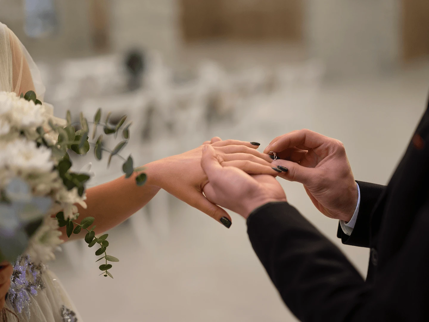 Couple signing the marriage register at a Cyprus municipality office during a civil ceremony.