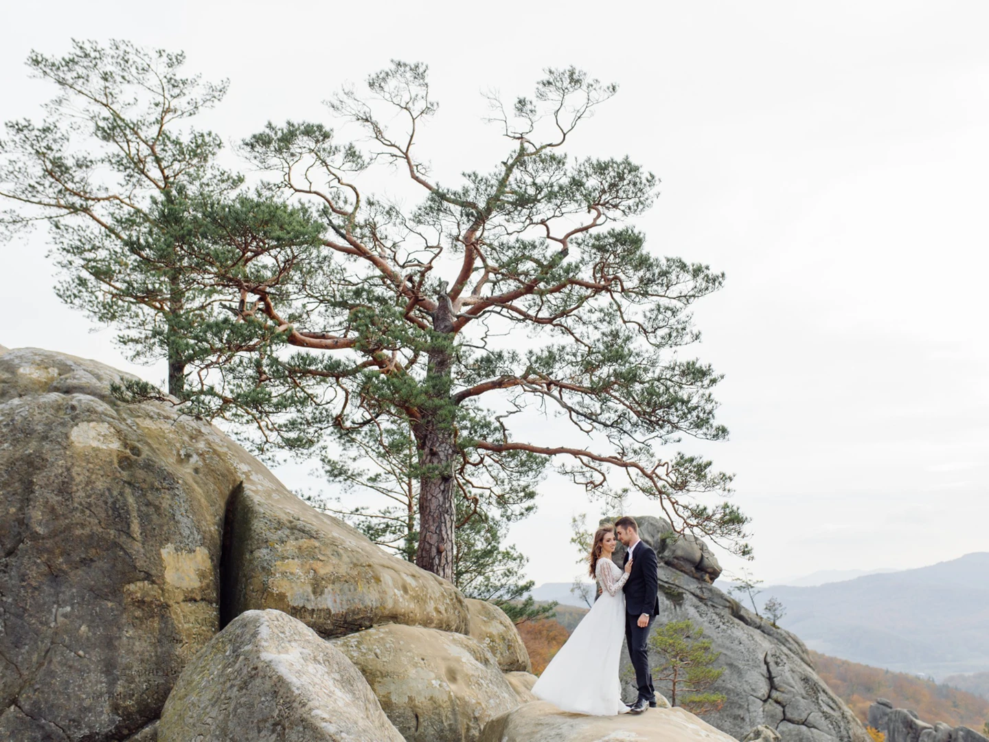 Intimate wedding ceremony in a restored stone courtyard in Omodos village, Troodos region.