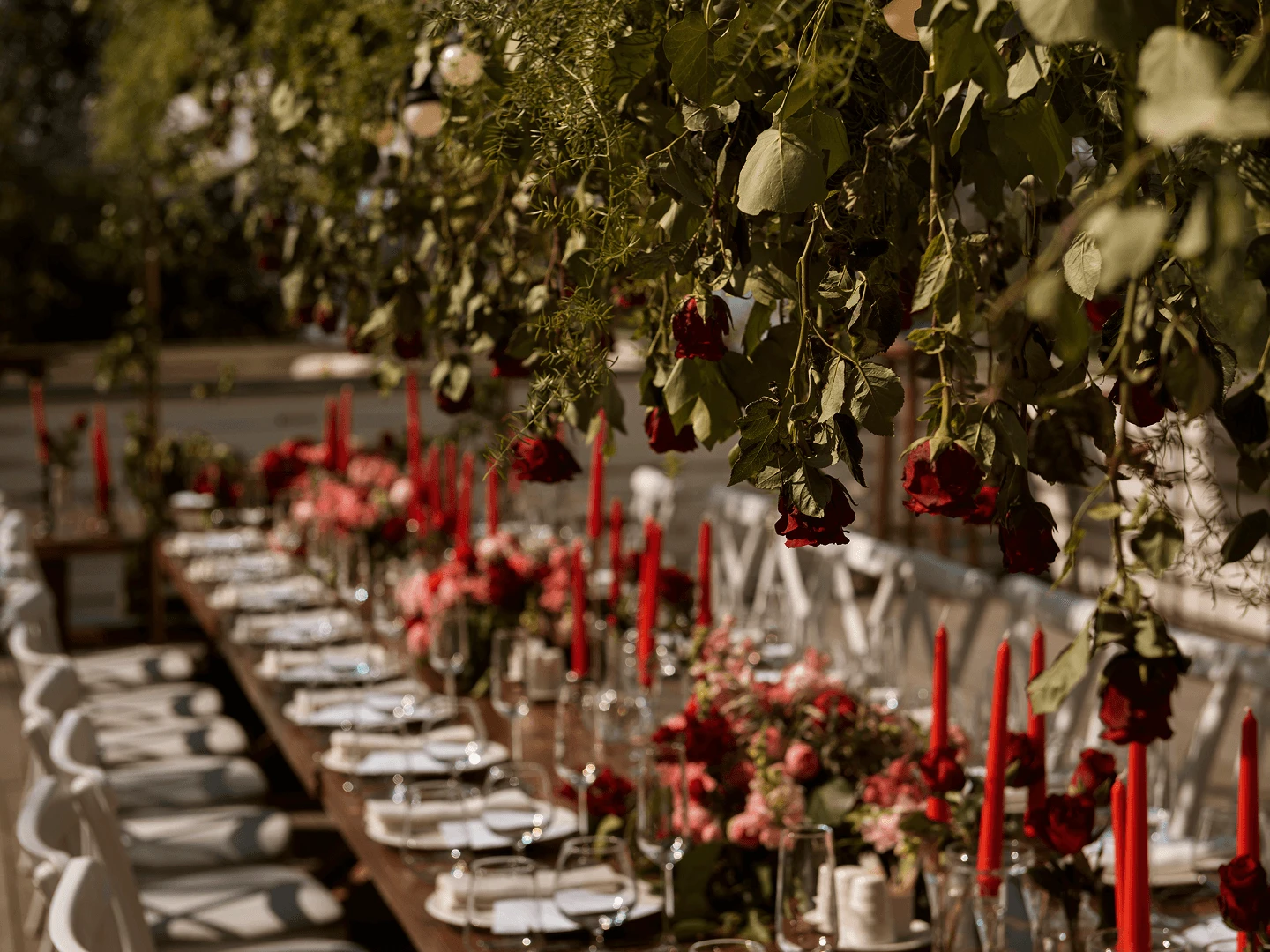 Premium wedding table setting at a Limassol seafront venue, with crystal glassware, white linen, and a multi-course dinner service.