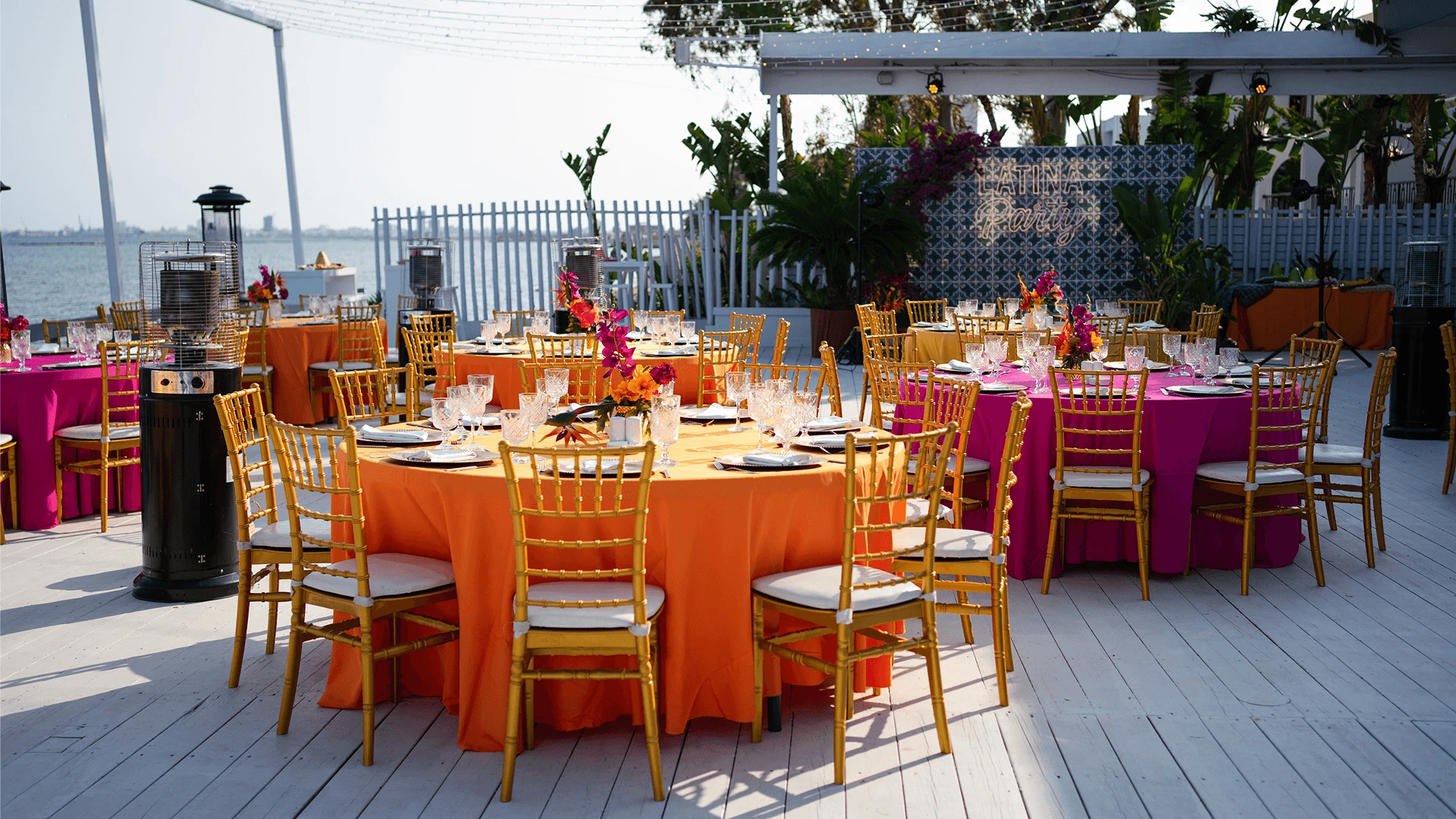 Corporate gala dinner in a Cyprus banquet hall — set tables, stage, and technical setup illustrating the structure of an event budget.