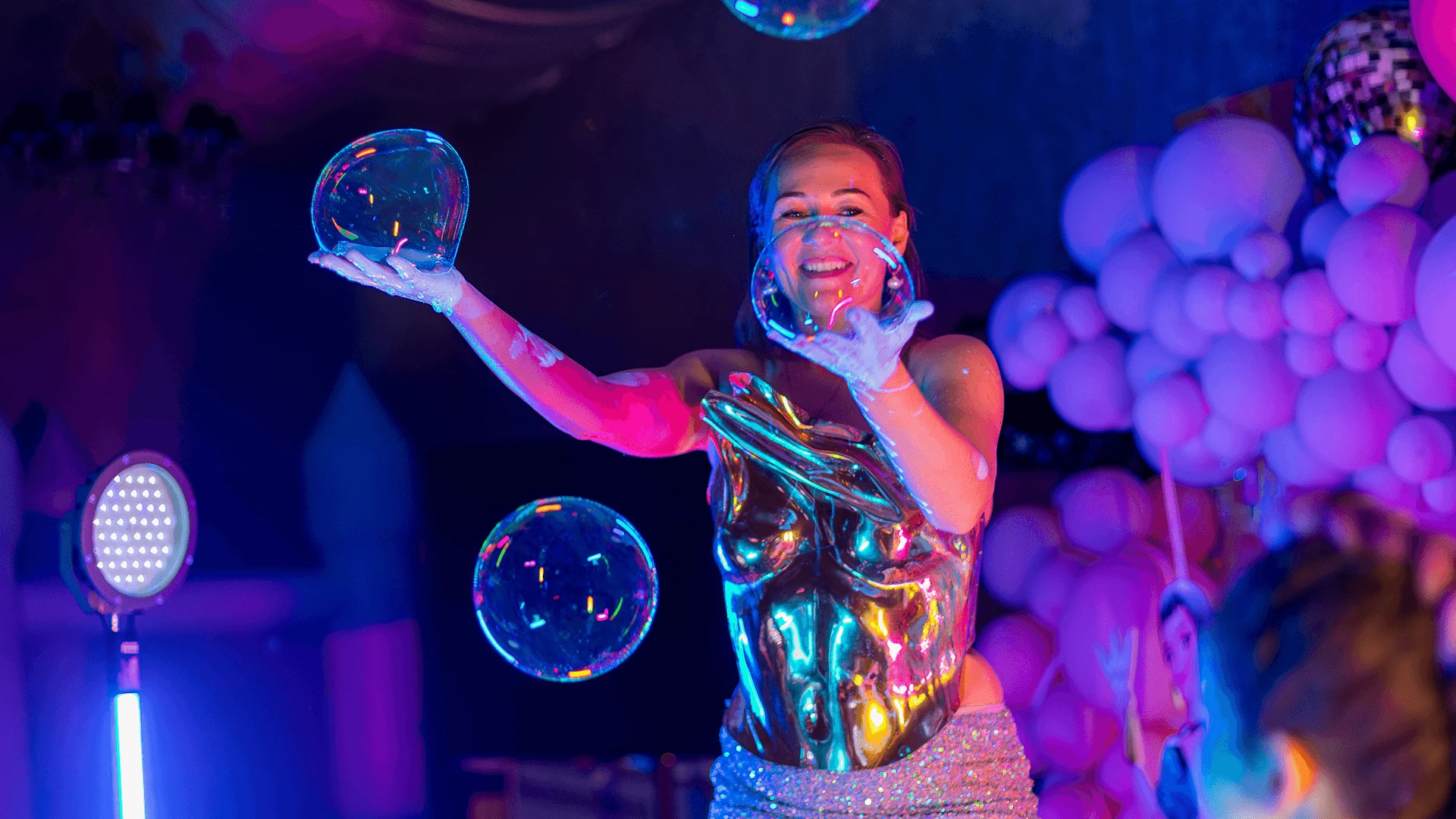 "Maria, founder of CyprusShow and event planner in Cyprus, performing Bubble Show.